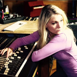 Kate Higgins at a soundboard