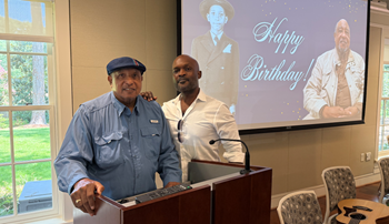 Dr. Bernard LaFayette Jr. and Khari Allen Lee posing for a photo at LaFayette's birthday celebration
