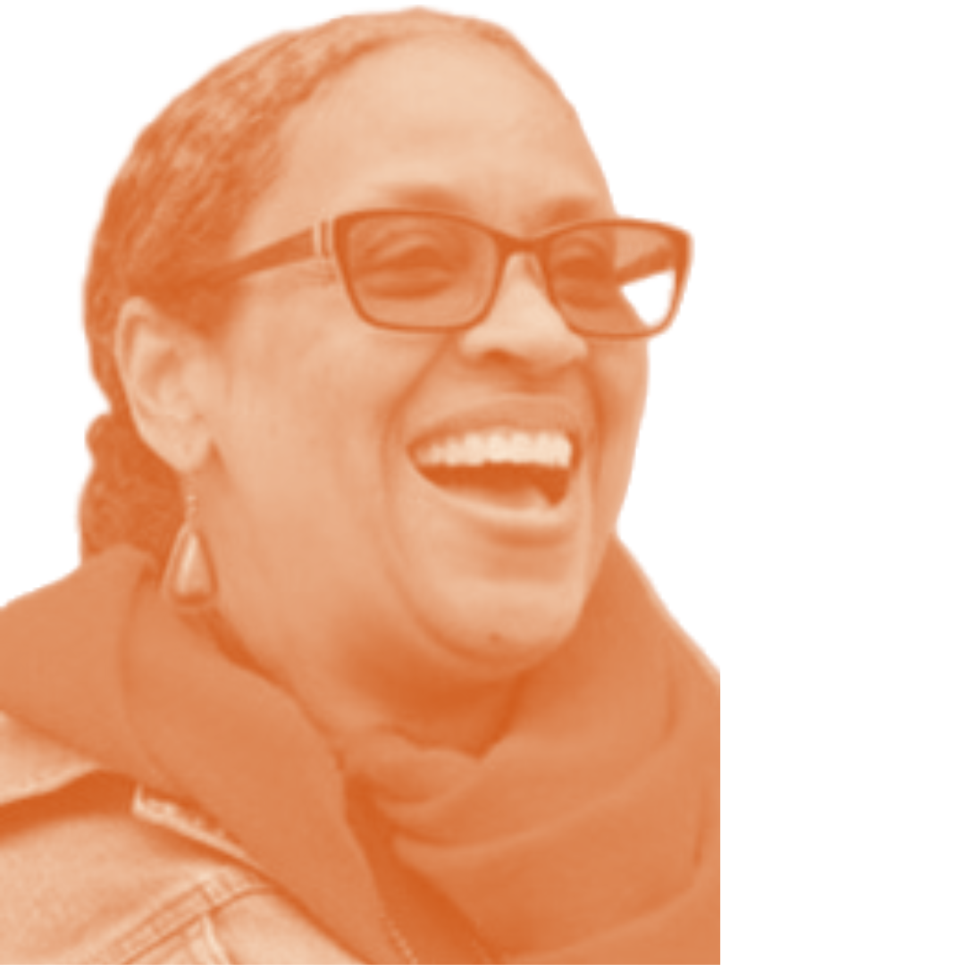 Image of smiling woman with glasses and scarf
