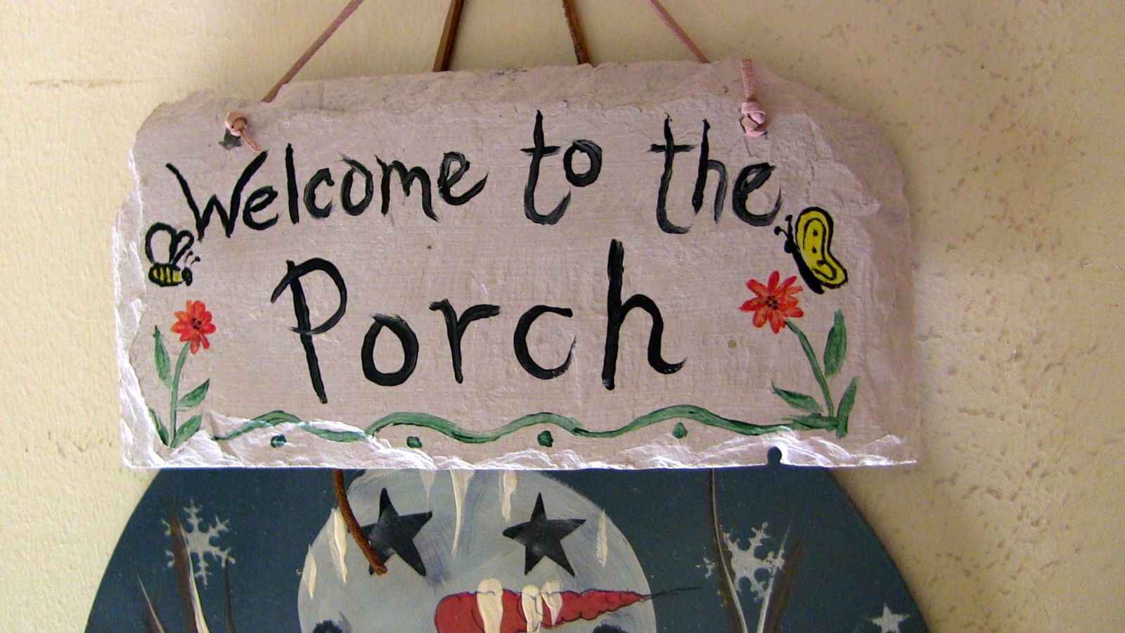 A sign that says &quot;Welcome to the Porch&quot;