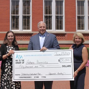 School of Communication and Journalism faculty receive 50,000 dollar check from the Alabama Broadcasters Association