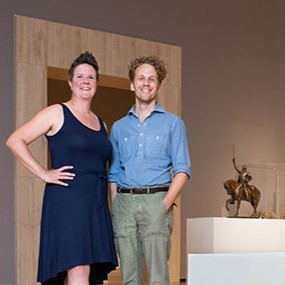 Drs. Kristen Tordella-Williams and Elijah Gaddis at the Monuments and Myths exhibition