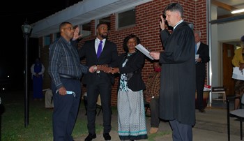 Messiah Williams-Cole is sworn in by Lee County Judge Mike Fellows