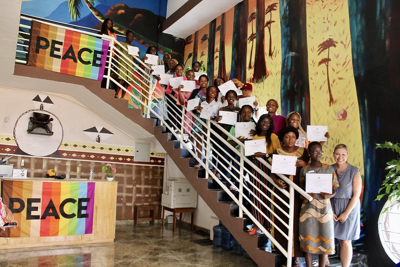 A group of Liberian students pose with certificates