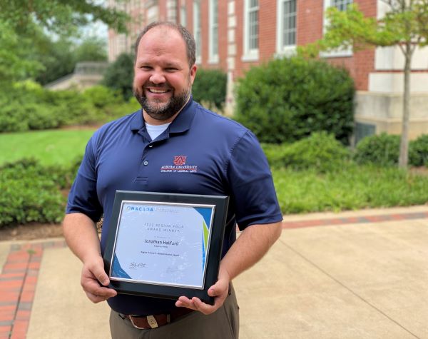 Jonathan Hallford with award