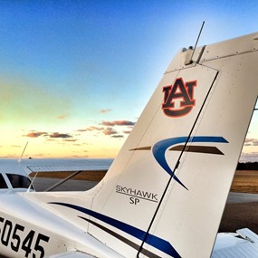 Plane with Auburn logo on wing