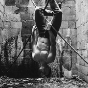 man hanging upside down