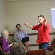 group of people talking a room